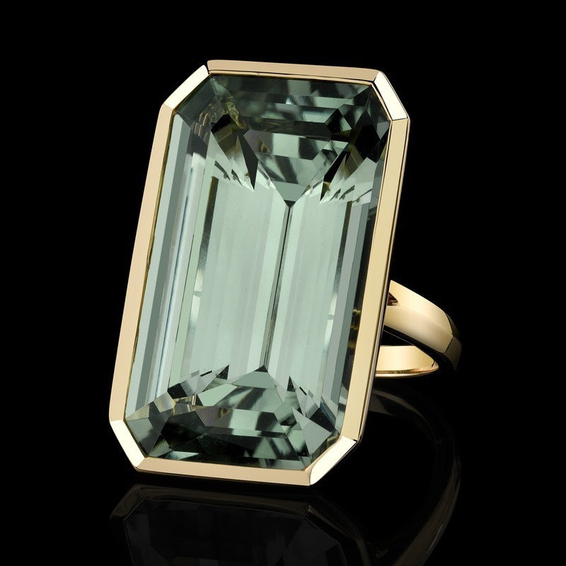 Golden Ring With A Green Square Zircon Inlay