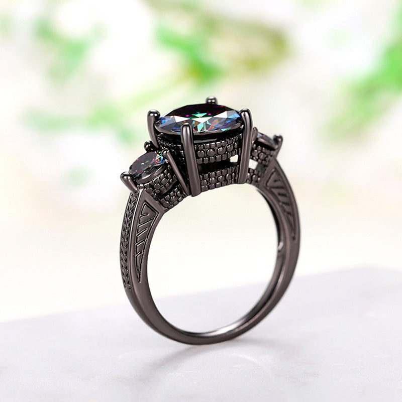 Fashionable Gun-black Ring With Three Dazzling Colored Stones